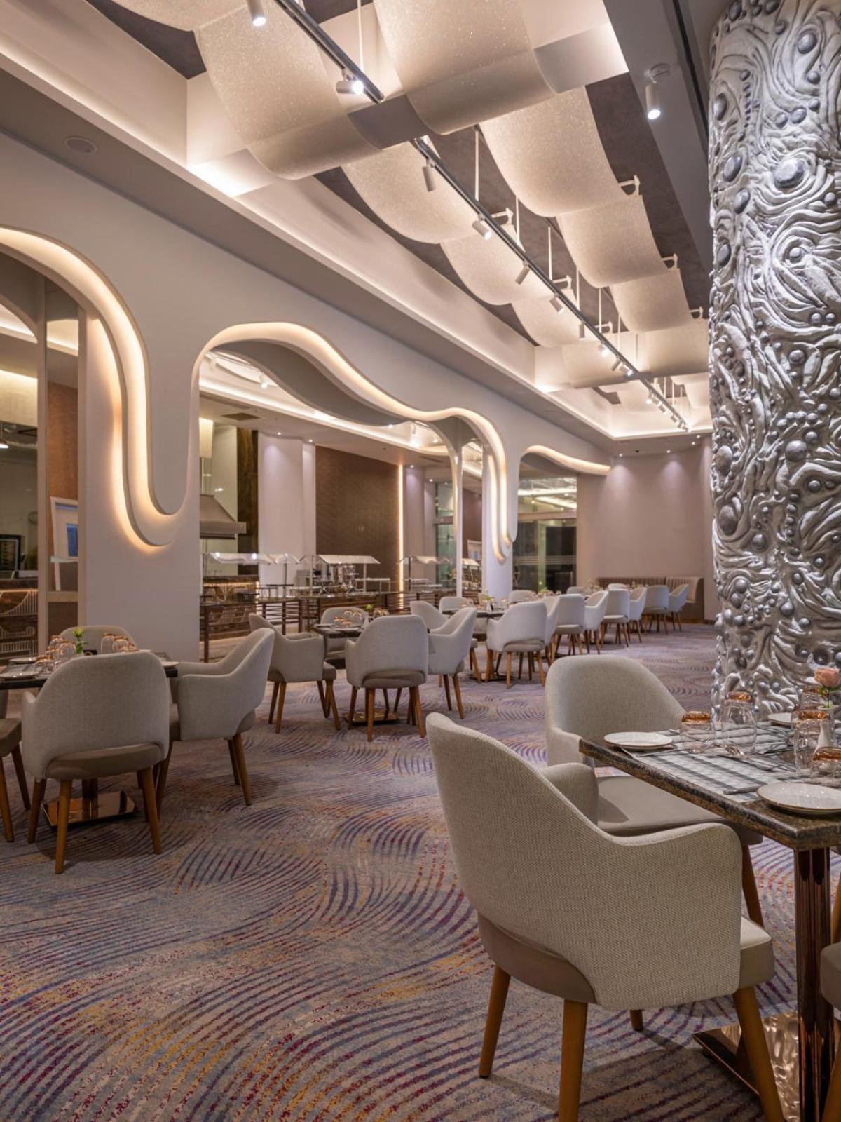 Mirage Hotel & Conference Center Alexandria Exterior foto The restaurant