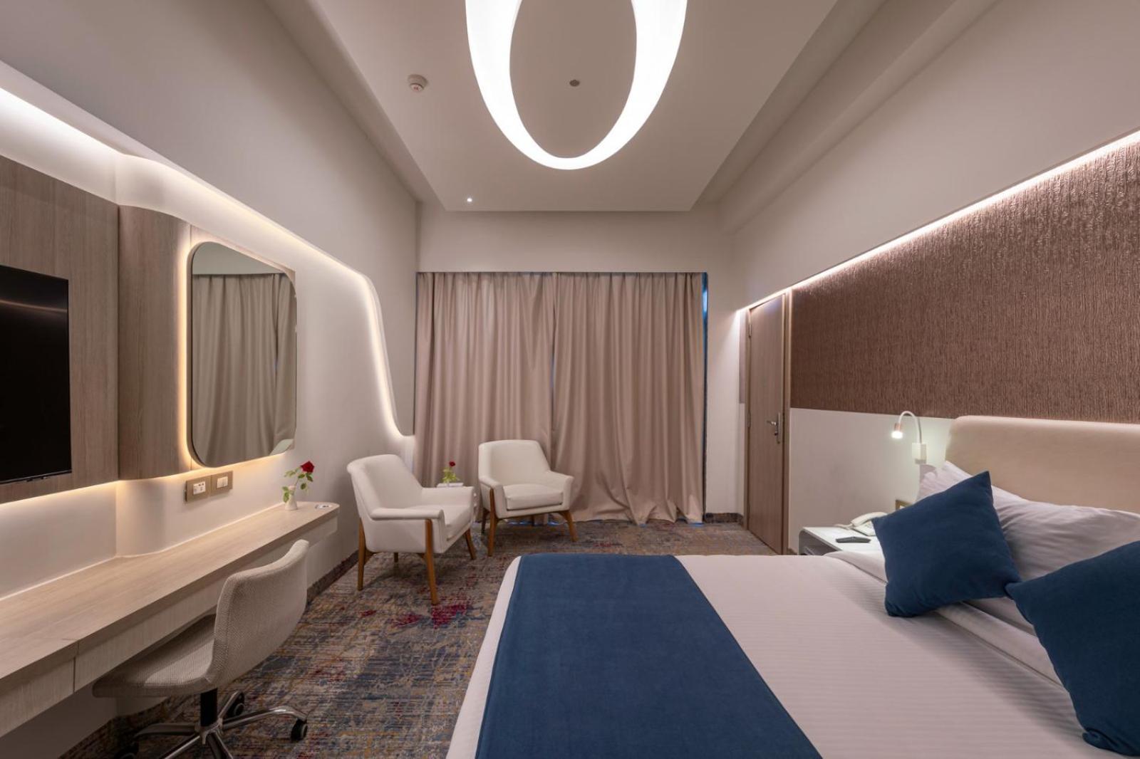 Mirage Hotel & Conference Center Alexandria Exterior foto A room at the hotel