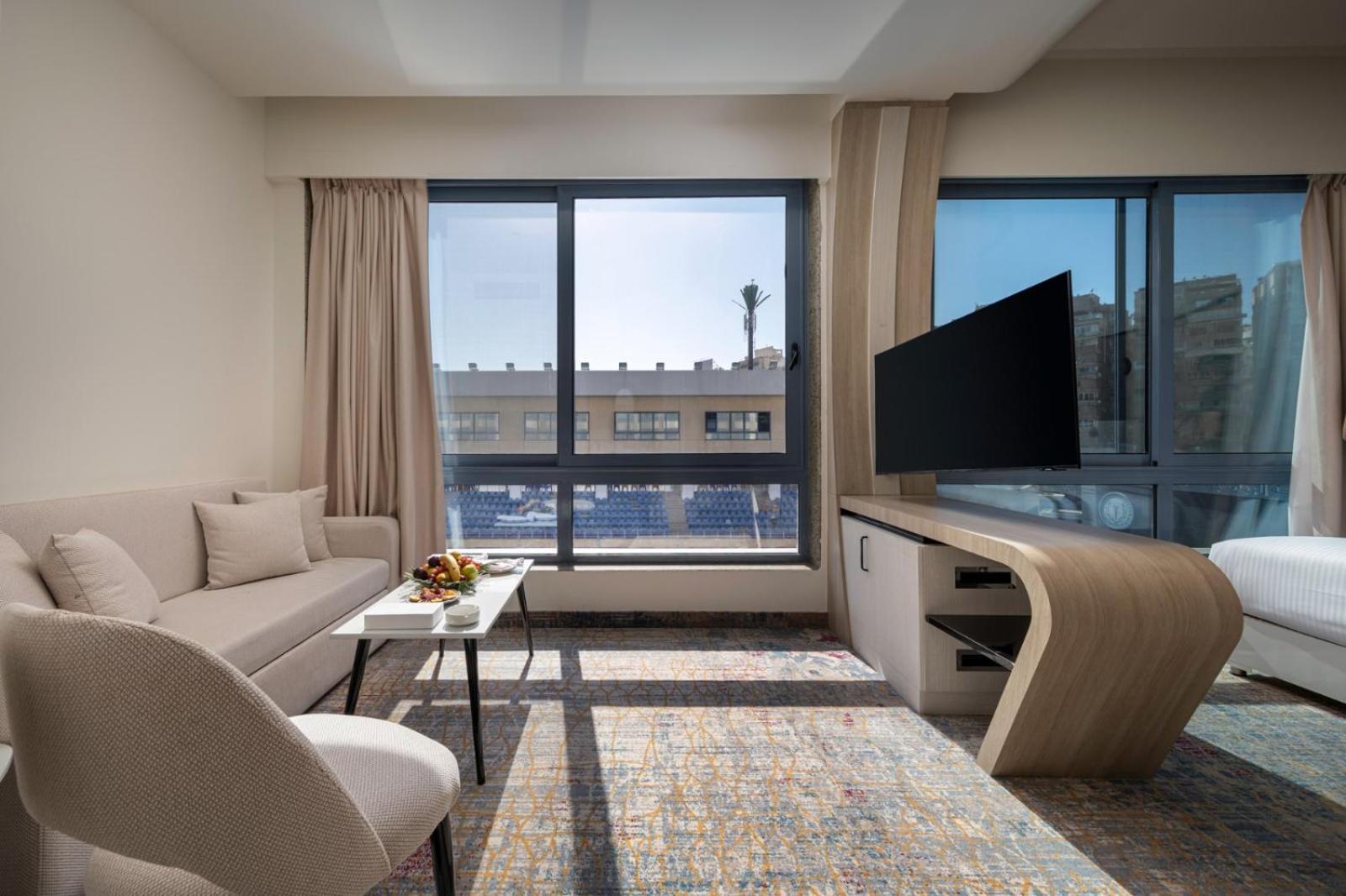 Mirage Hotel & Conference Center Alexandria Exterior foto A room at the hotel