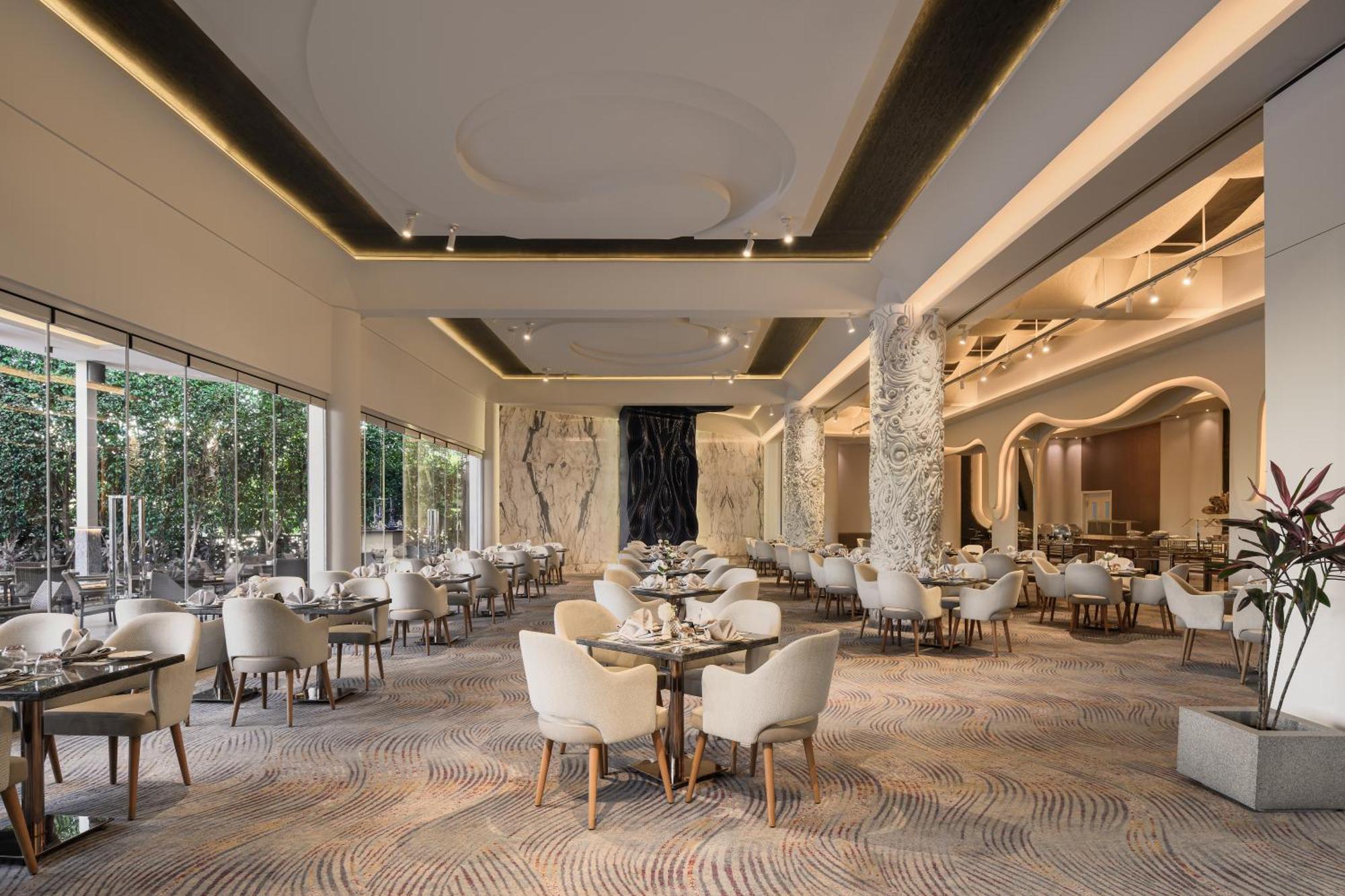 Mirage Hotel & Conference Center Alexandria Exterior foto The restaurant