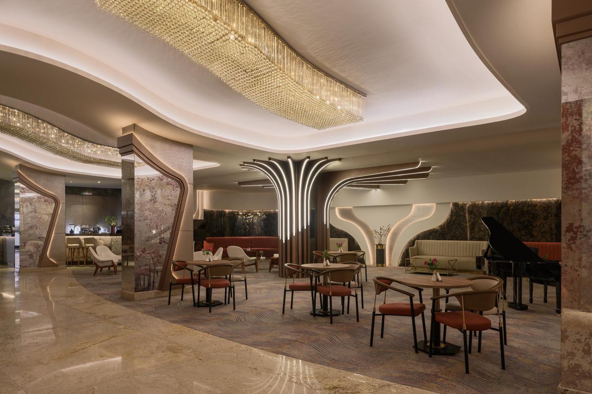 Mirage Hotel & Conference Center Alexandria Exterior foto The interior of the lounge